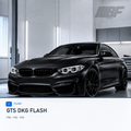 Schwarzer BMW M4 F82 im hellen Werkstattstudio